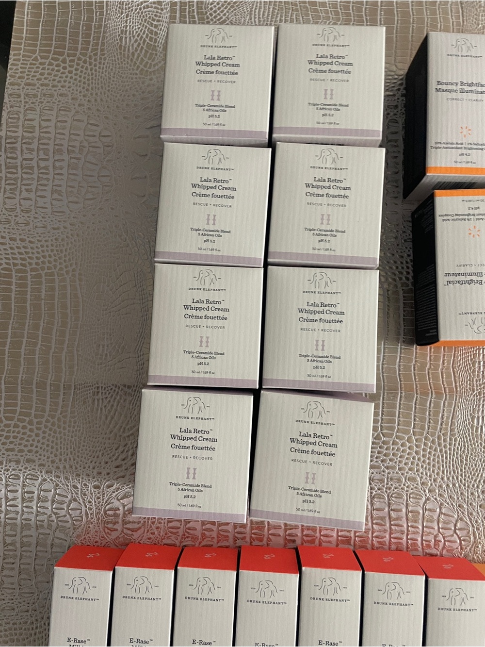 Drunk Elephant White with Lavender Accent Stacked Lala Retro Whipped Cream Boxes